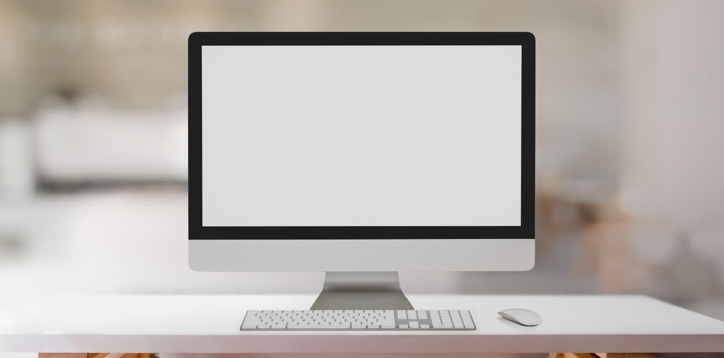 Entrepreneur working on a professional website with business graphics and growth statistics